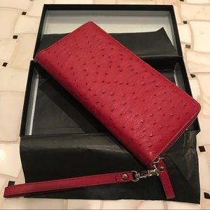 Borlino red ostrich leather clutch